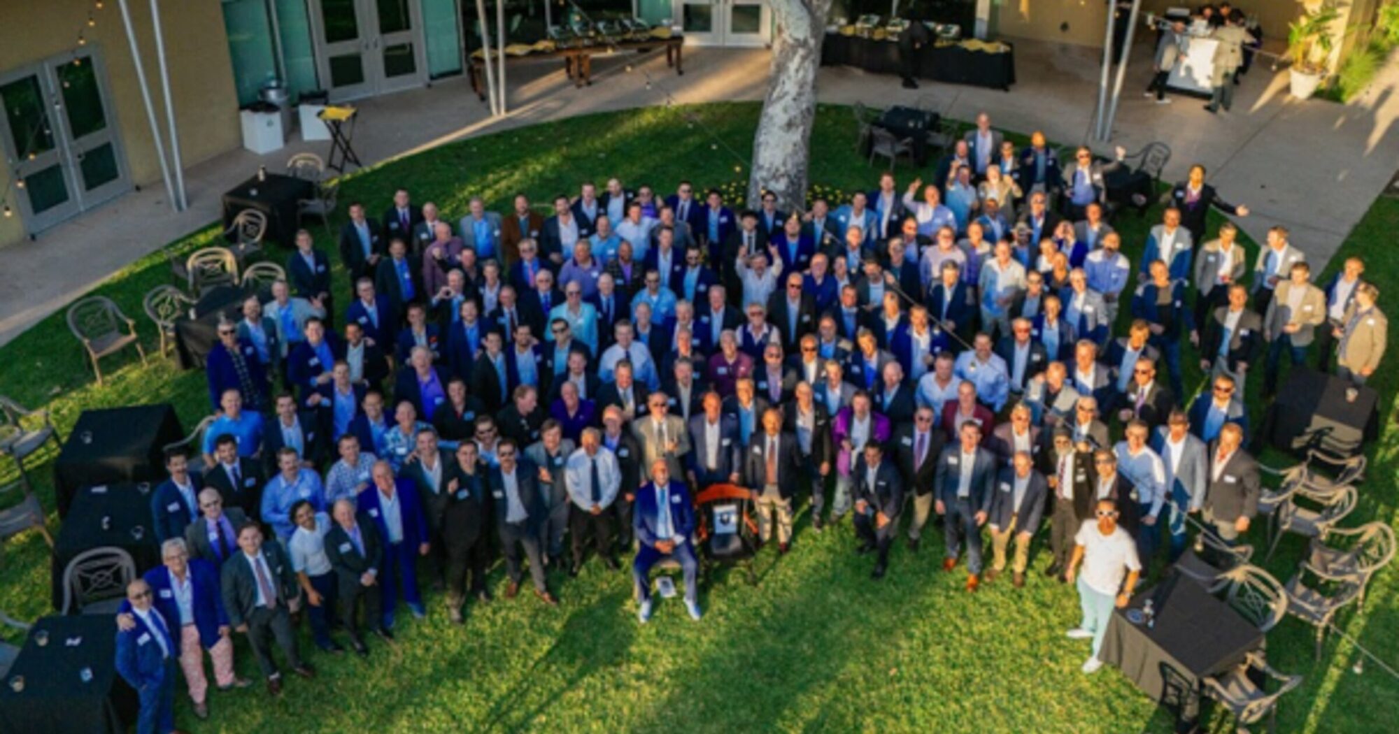 Graduate brothers gathered on the lawn at the 50th anniversary reunion